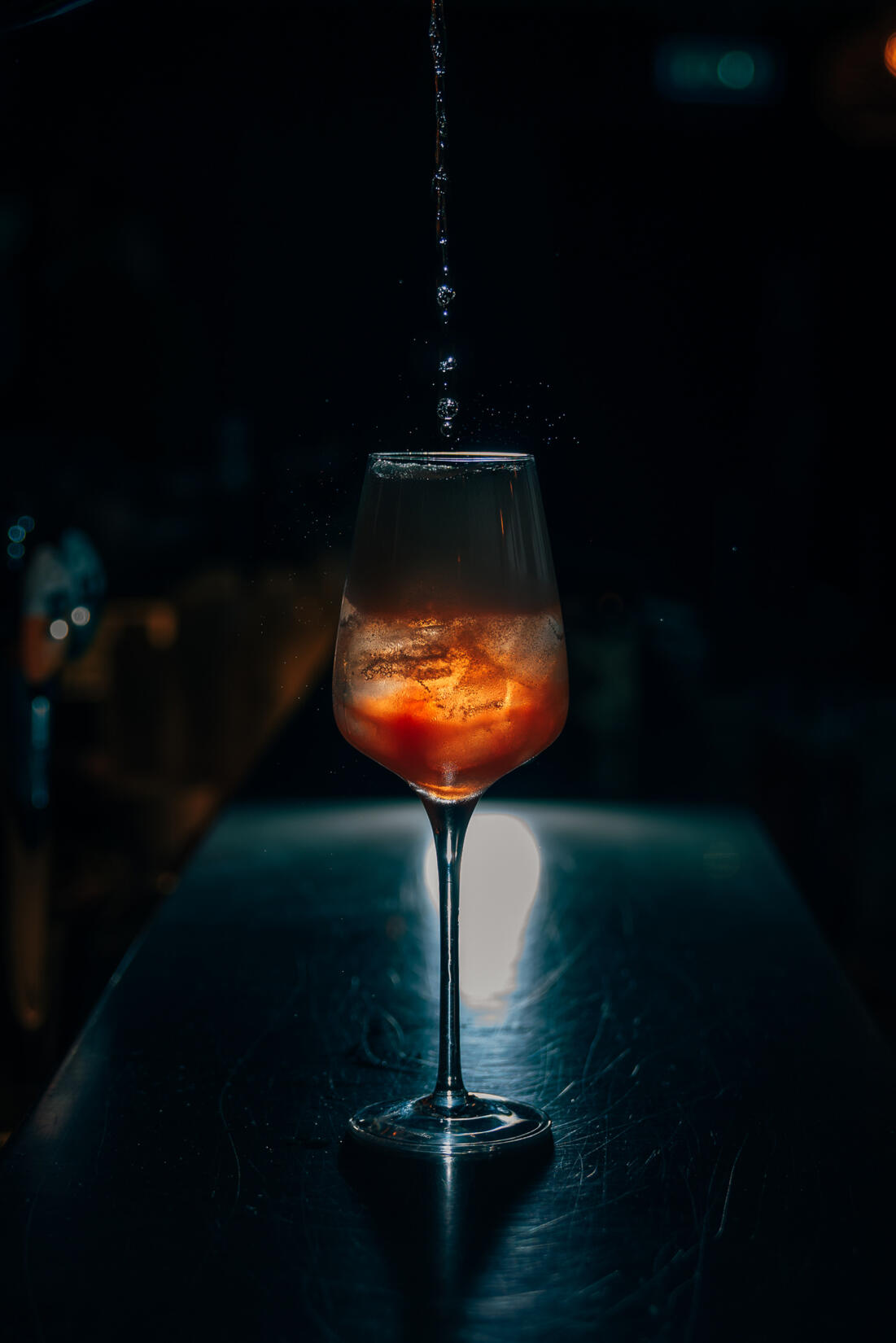 Sloe gin spritz cocktail in the Living Space at Watergate Bay