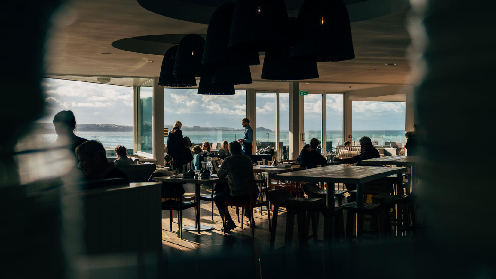 The Living Space restaurant with floor to ceiling windows overlooking the Atlantic sea