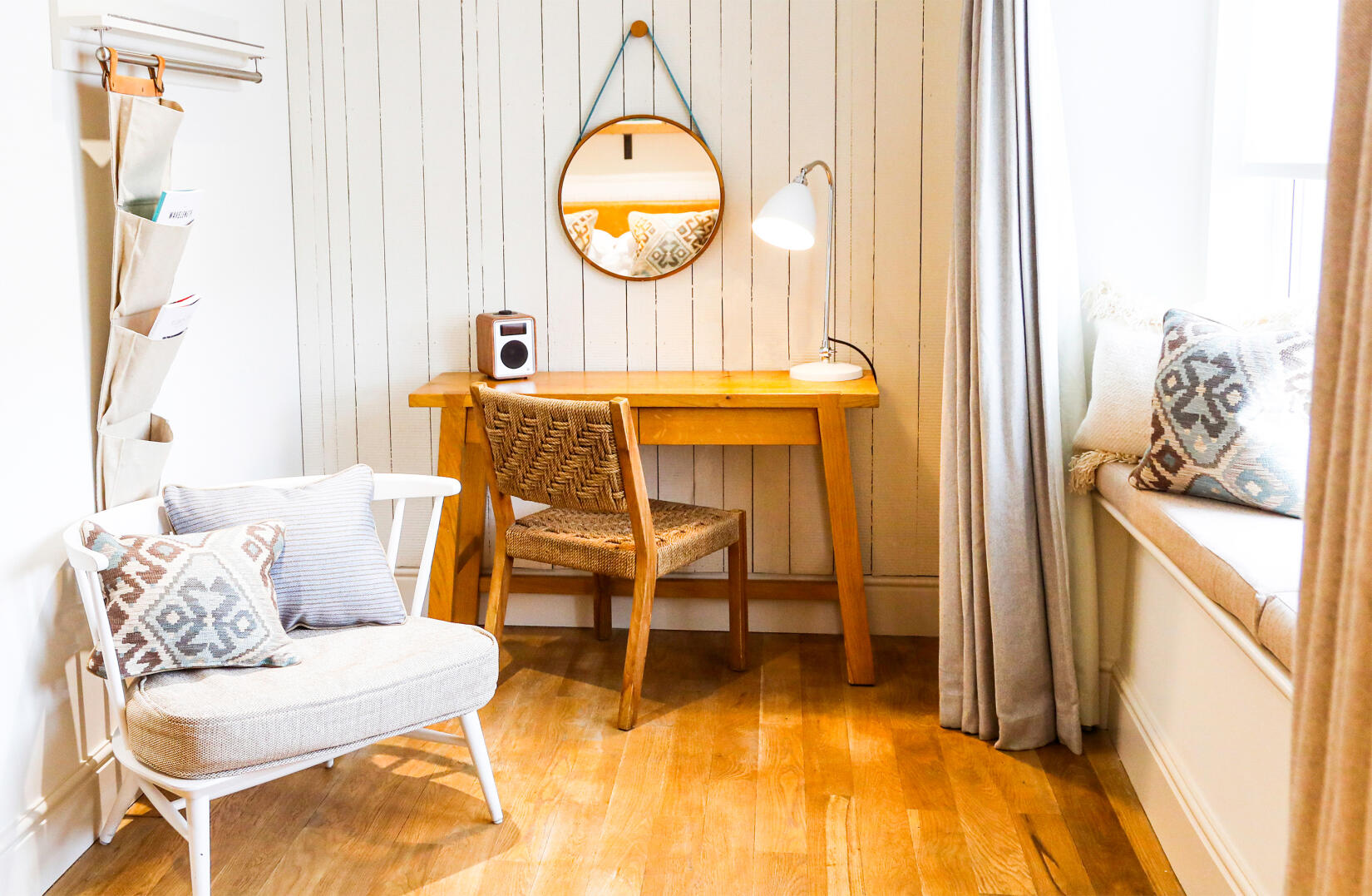 Desk and seating area in a double bedroom