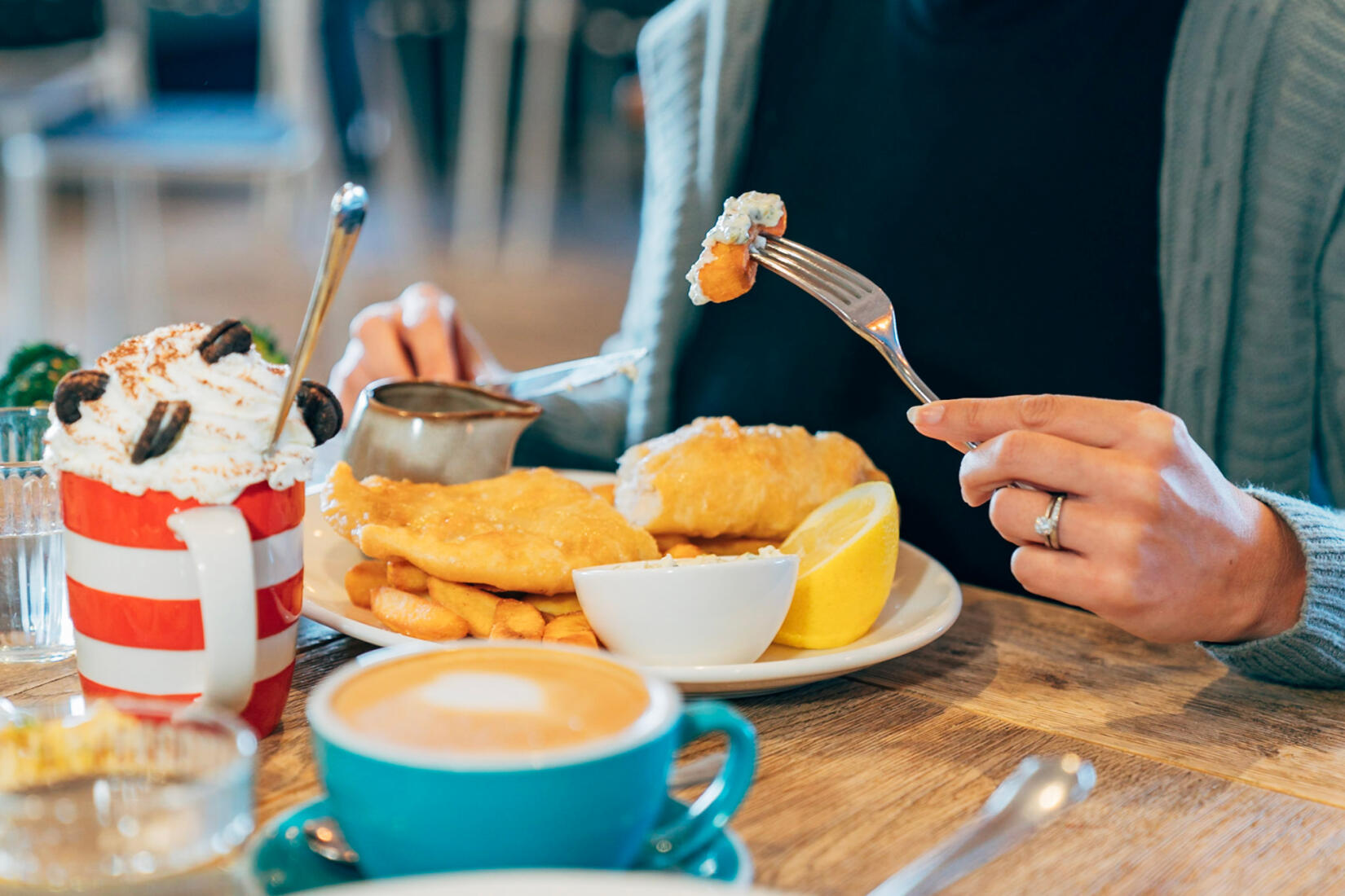 Beach hut fish and chips batter on a plate with a slice of lemon