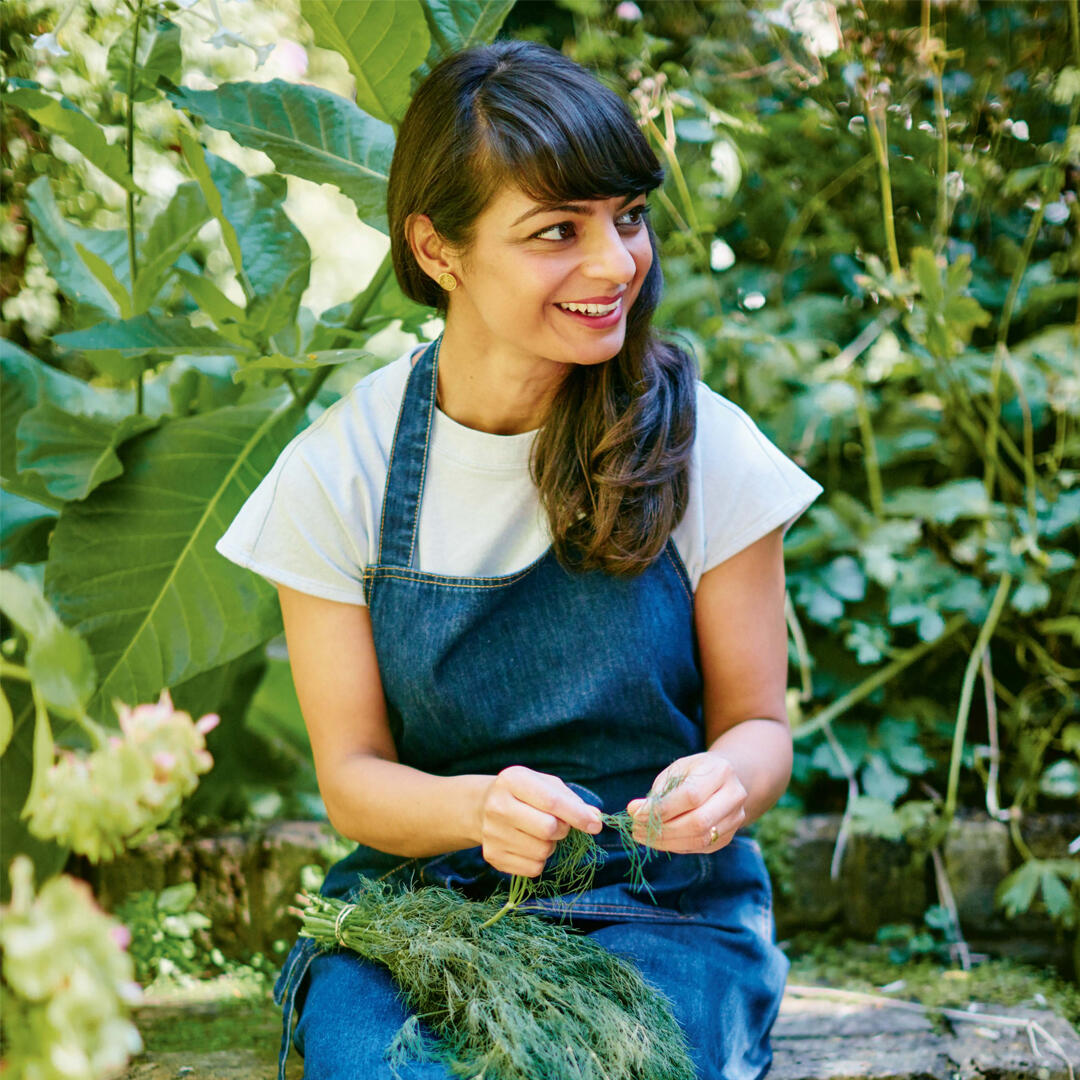 Meera Sodha sits picking fennel