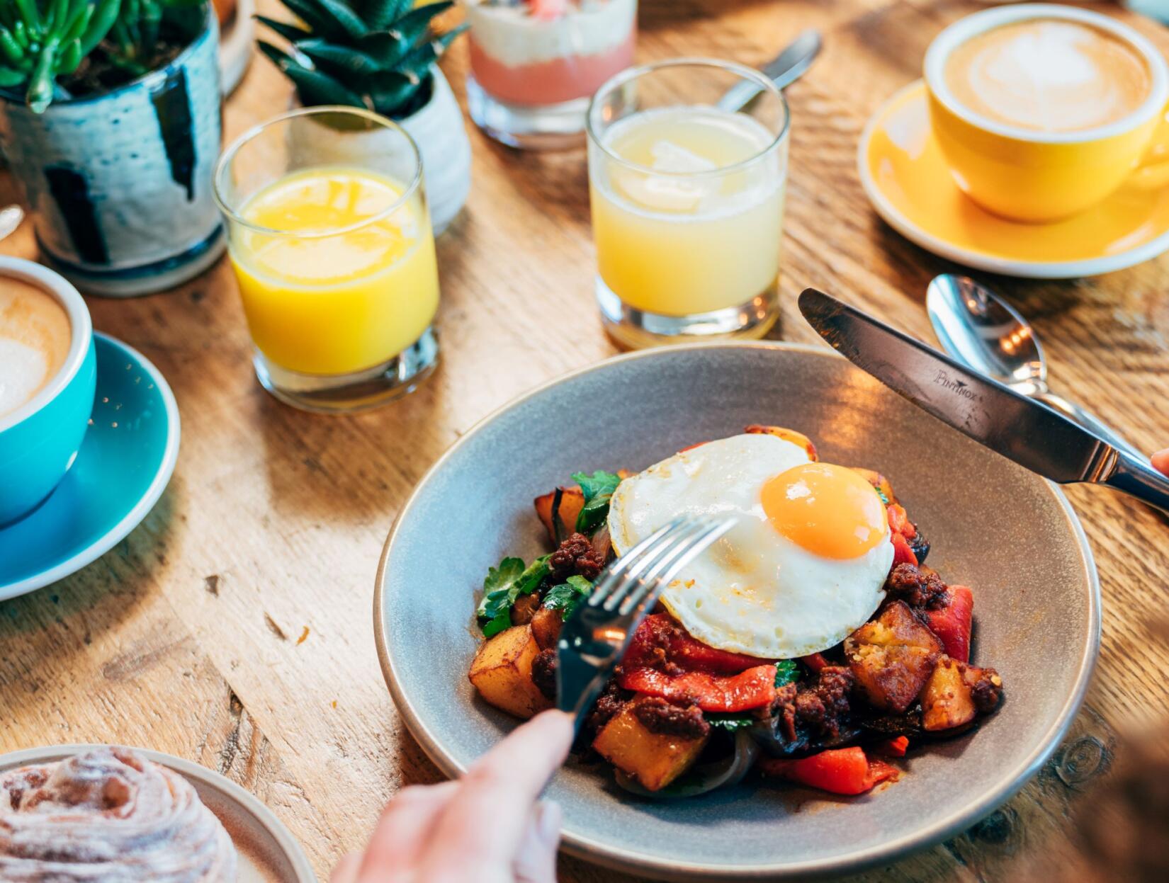 Bowl of hash it up with a fried egg on top