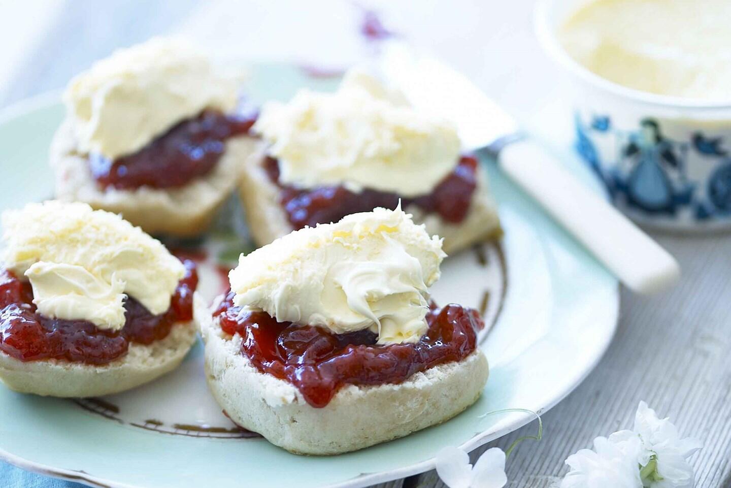 Cornish scones on a plate with jam and cream recipe