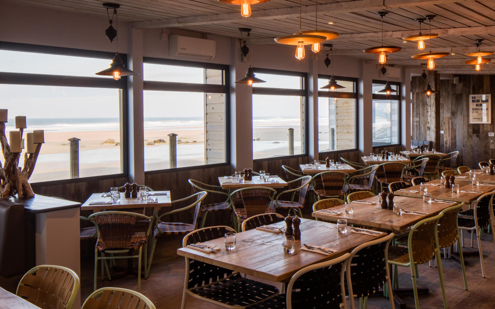 Eat in the Beach Hut with views over the beach at Watergate Bay