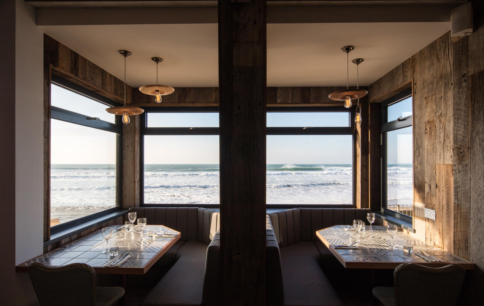 The two window banquette seats in the Beach Hut