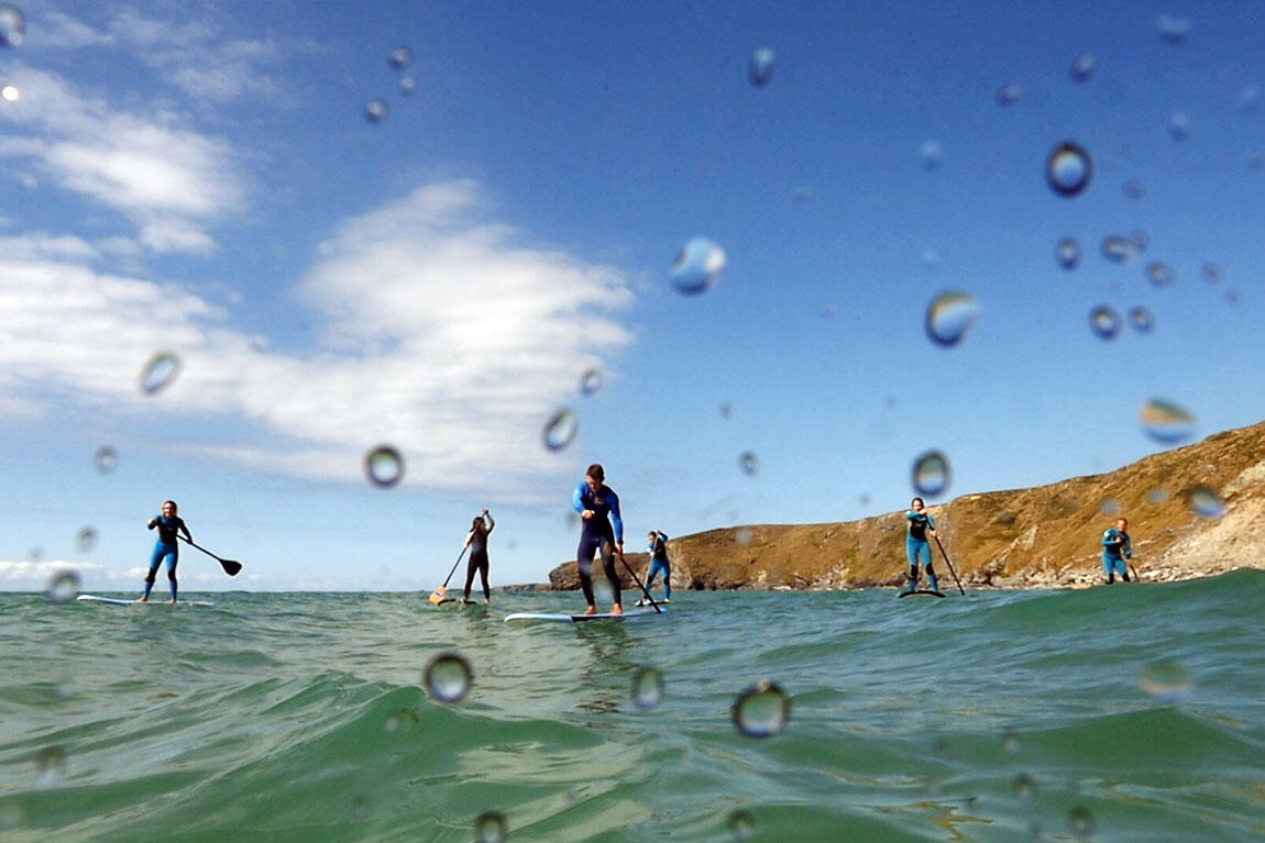 Standup paddleboarders on the water