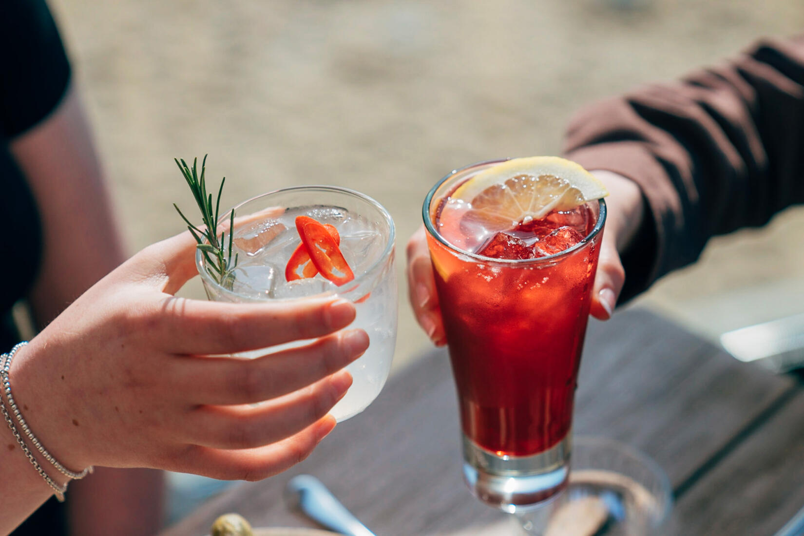 Friends enjoy a couple of cocktails in the Beach Hut in summer