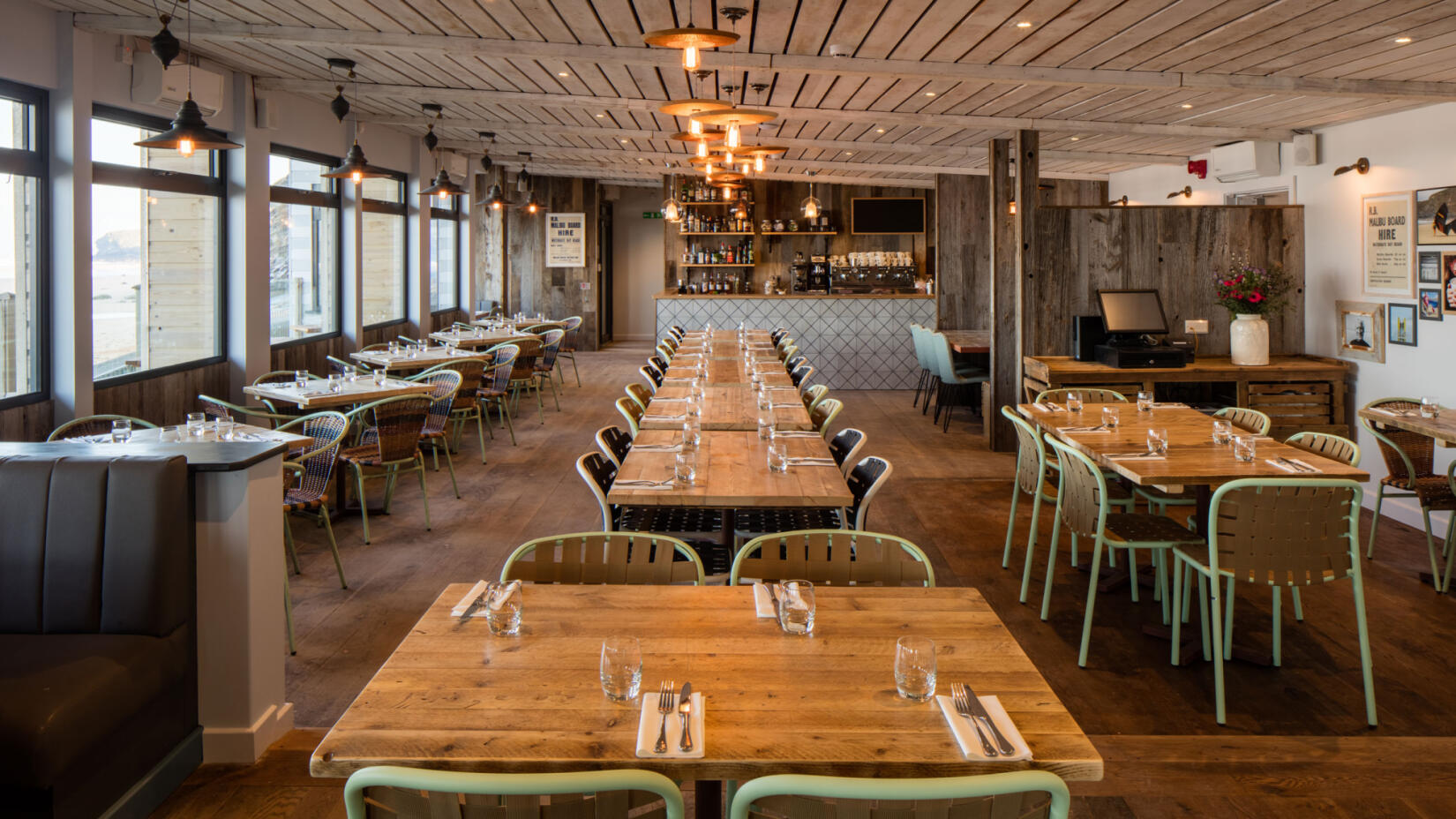 The Beach Hut restaurant interior with views over Watergate Bay