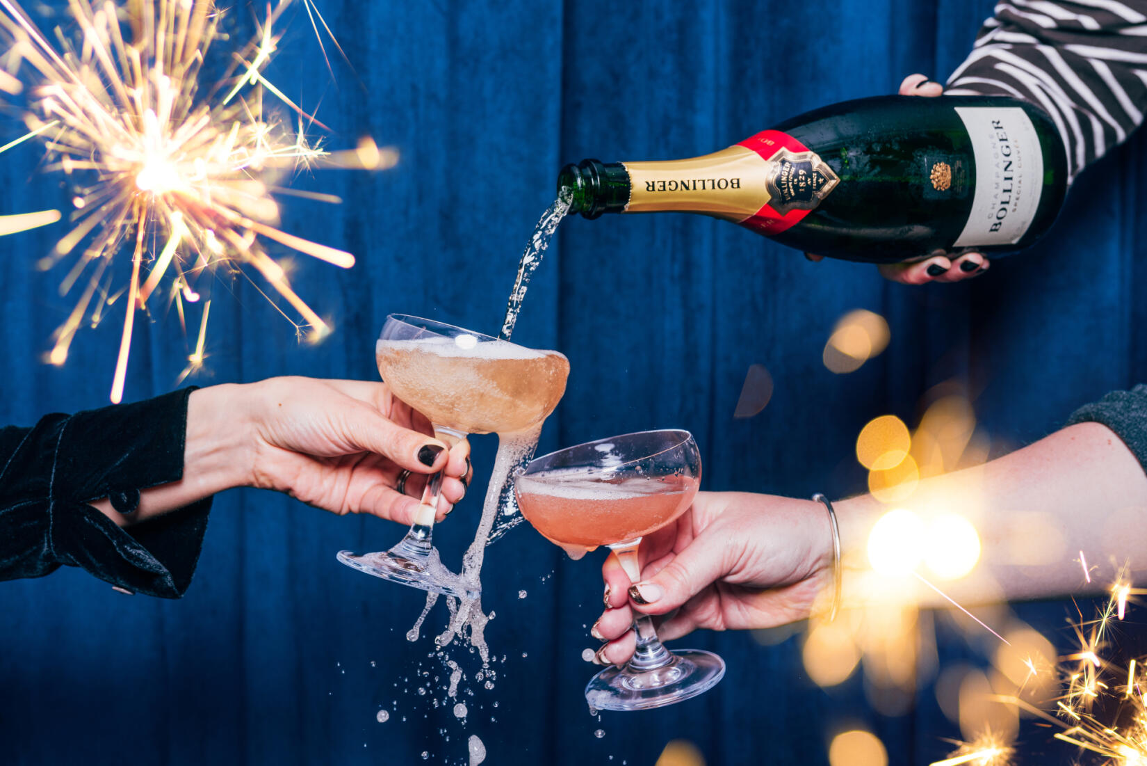 Jolly Bolly cocktail with champagne being poured