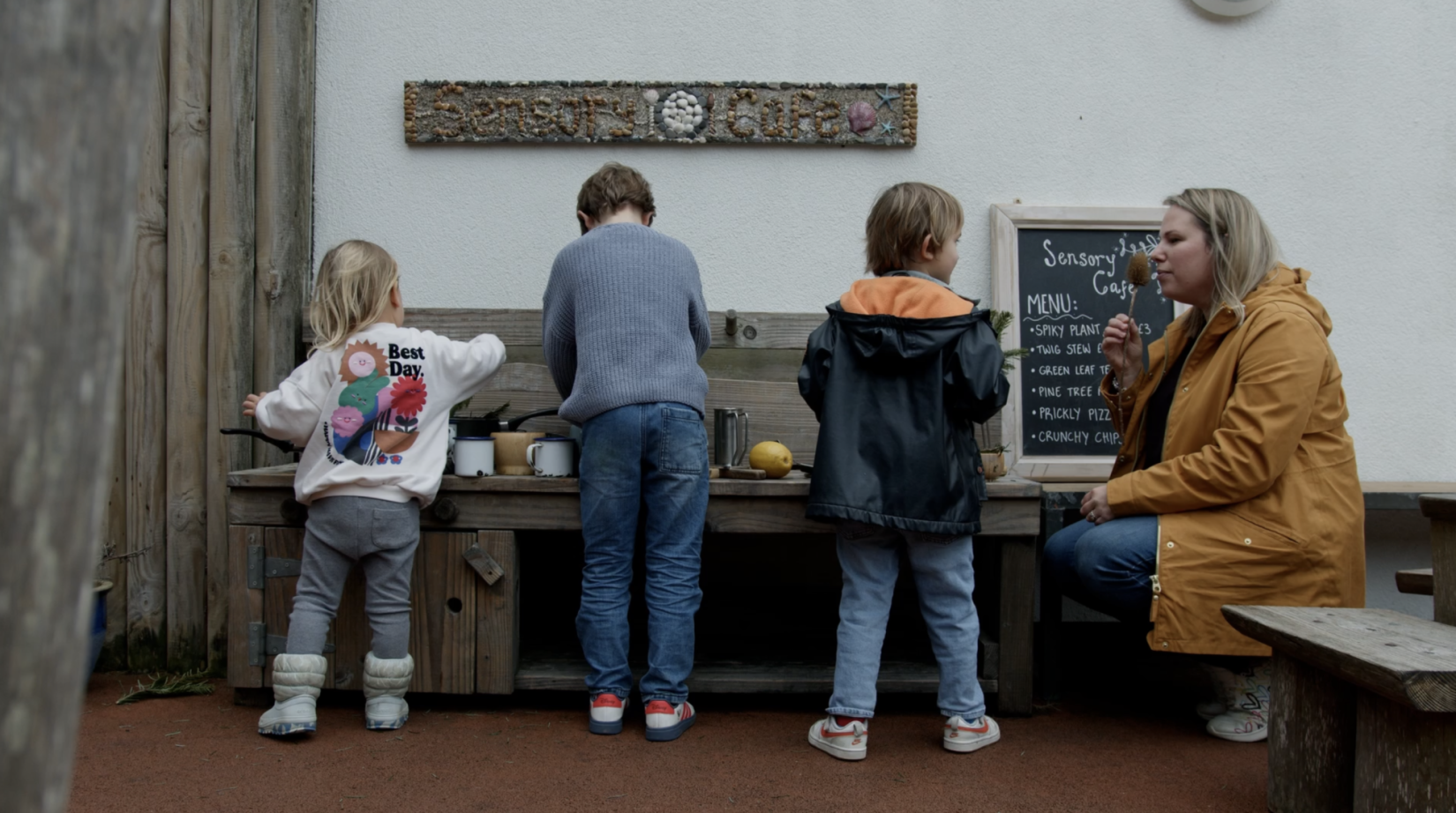 Children playing outside at Kids Zone